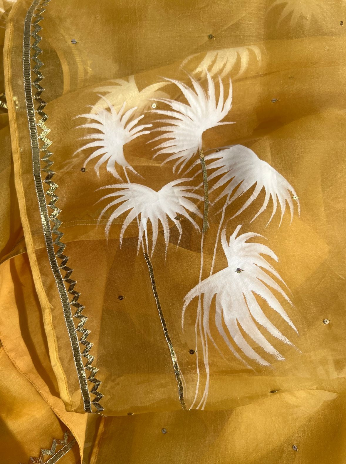 Palm trees on haldi yellow organza saree