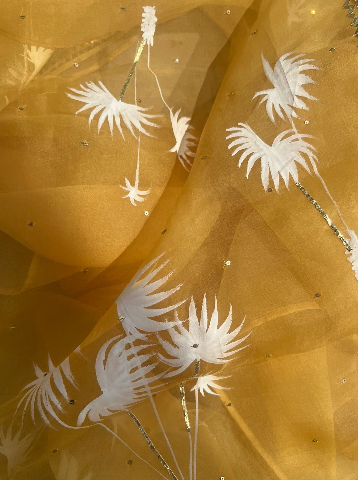 Palm trees on haldi yellow organza saree