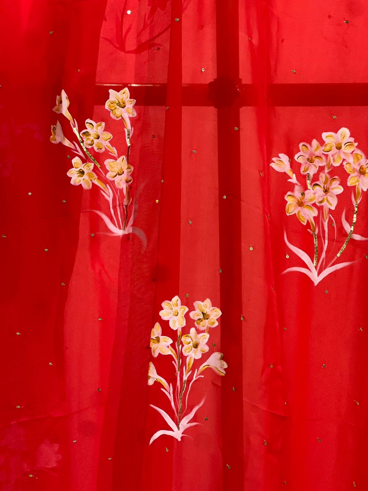 Tuber Roses on Red Flat Chiffon Saree With Sequins
