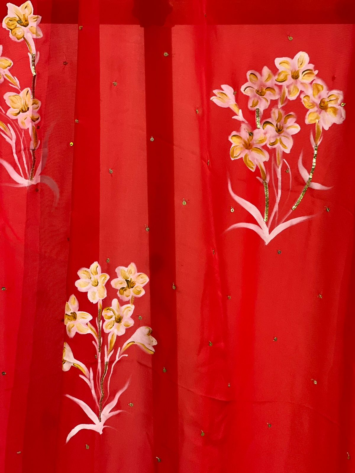 Tuber Roses on Red Flat Chiffon Saree With Sequins