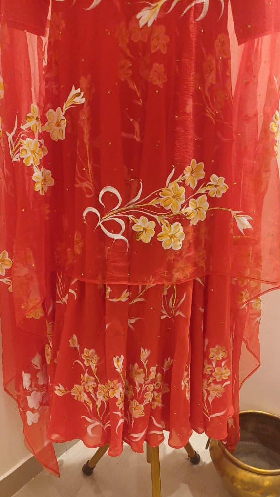 Tuber roses on red with Sitara’s flared kurta
