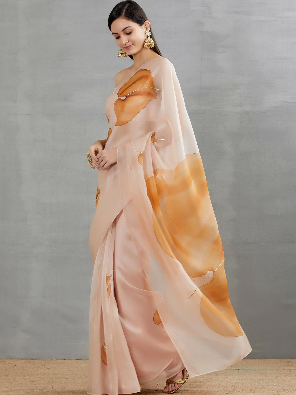 Chocolate brown anthuriums On Dull Rose Organza Saree