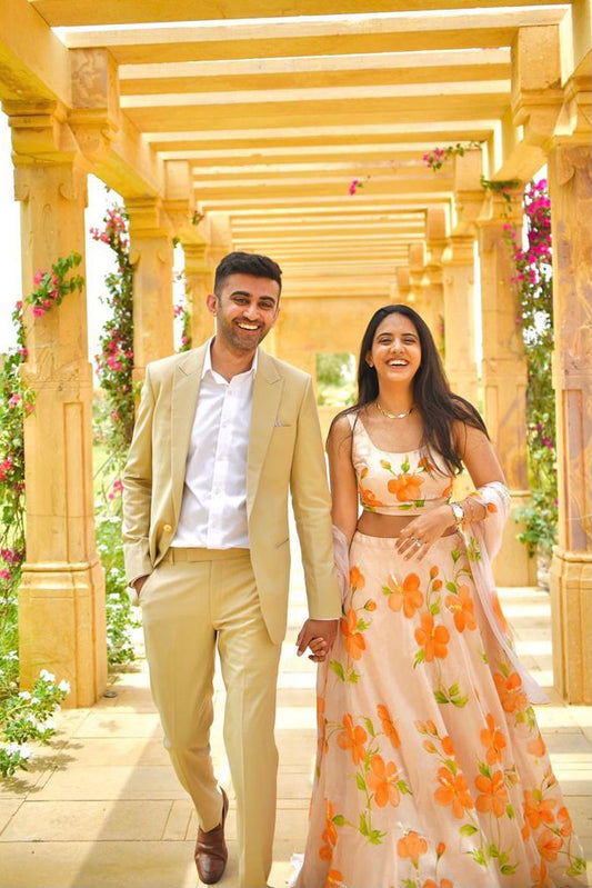 Saffron Hibiscus roses on dull rose