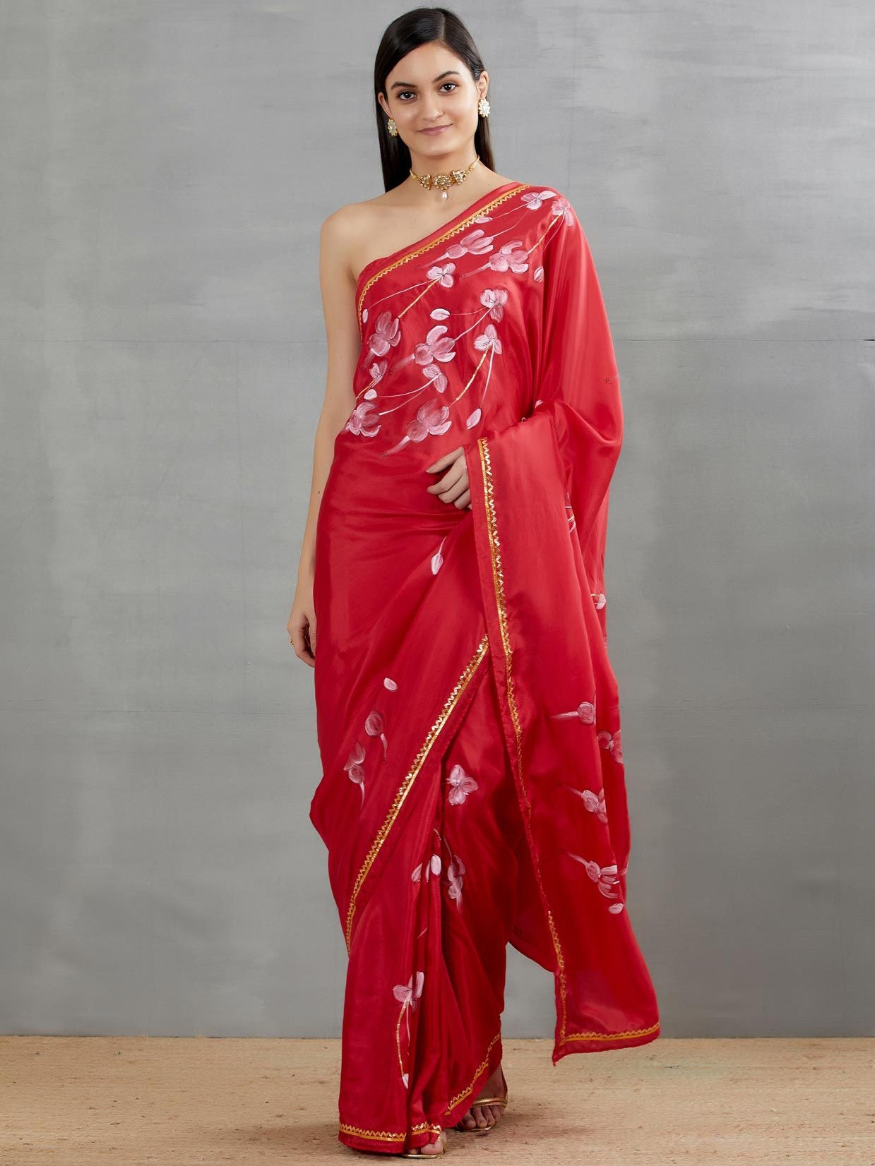 White Fuschia’s On Red Silk Saree with border
