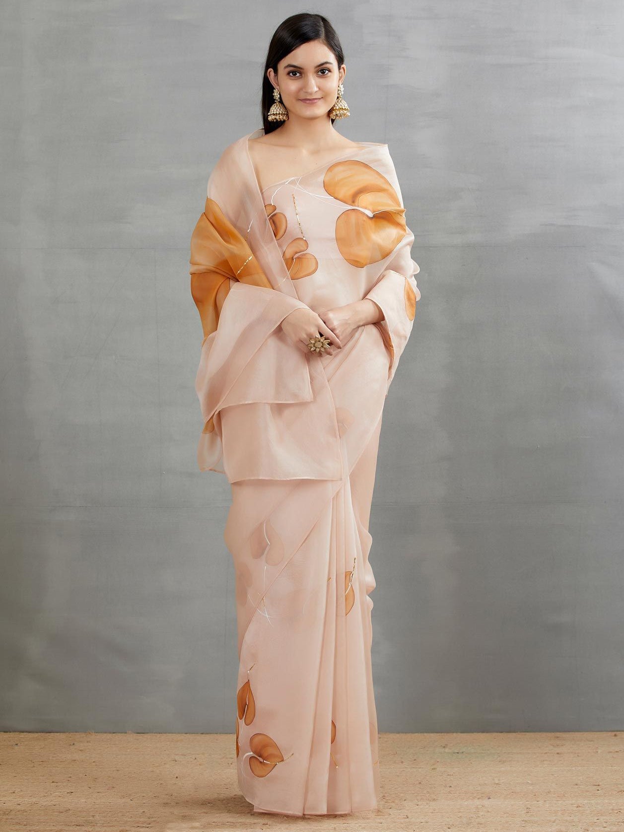 Chocolate brown anthuriums On Dull Rose Organza Saree