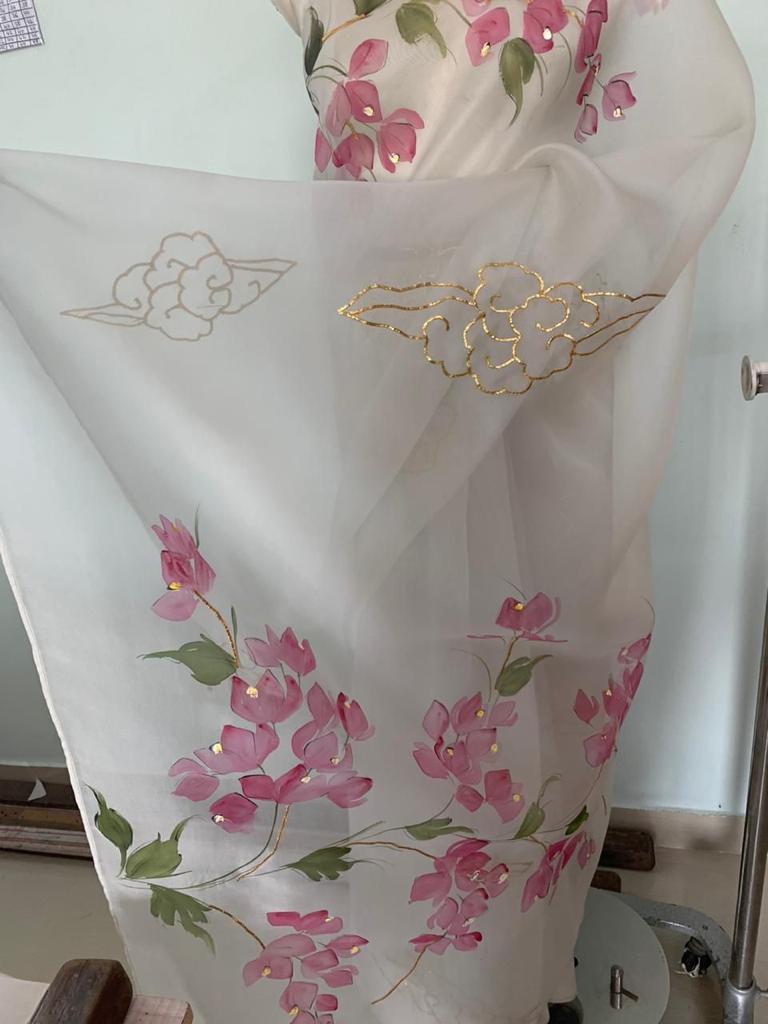 Custom cloud in Dull Ivory with Bougainville