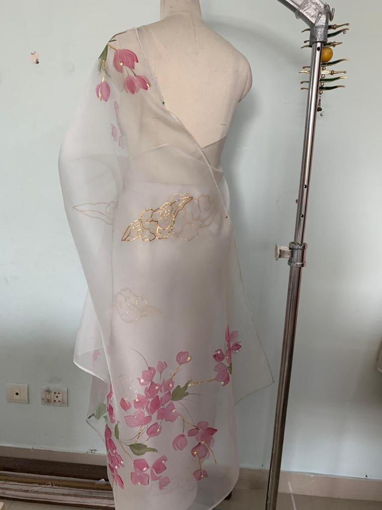 Custom cloud in Dull Ivory with Bougainville