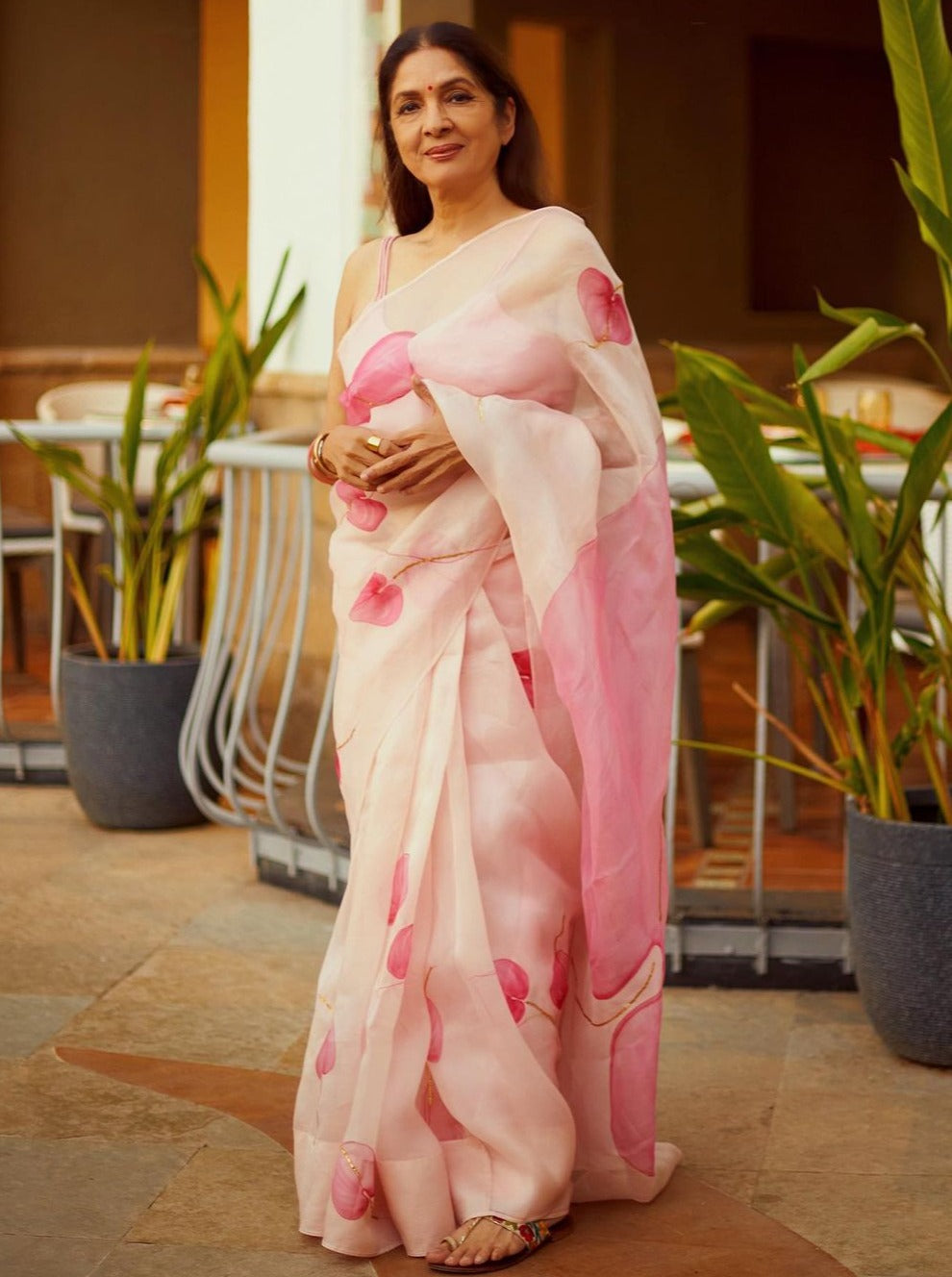 Flamingo flowers on Dull Rose Organza Saree