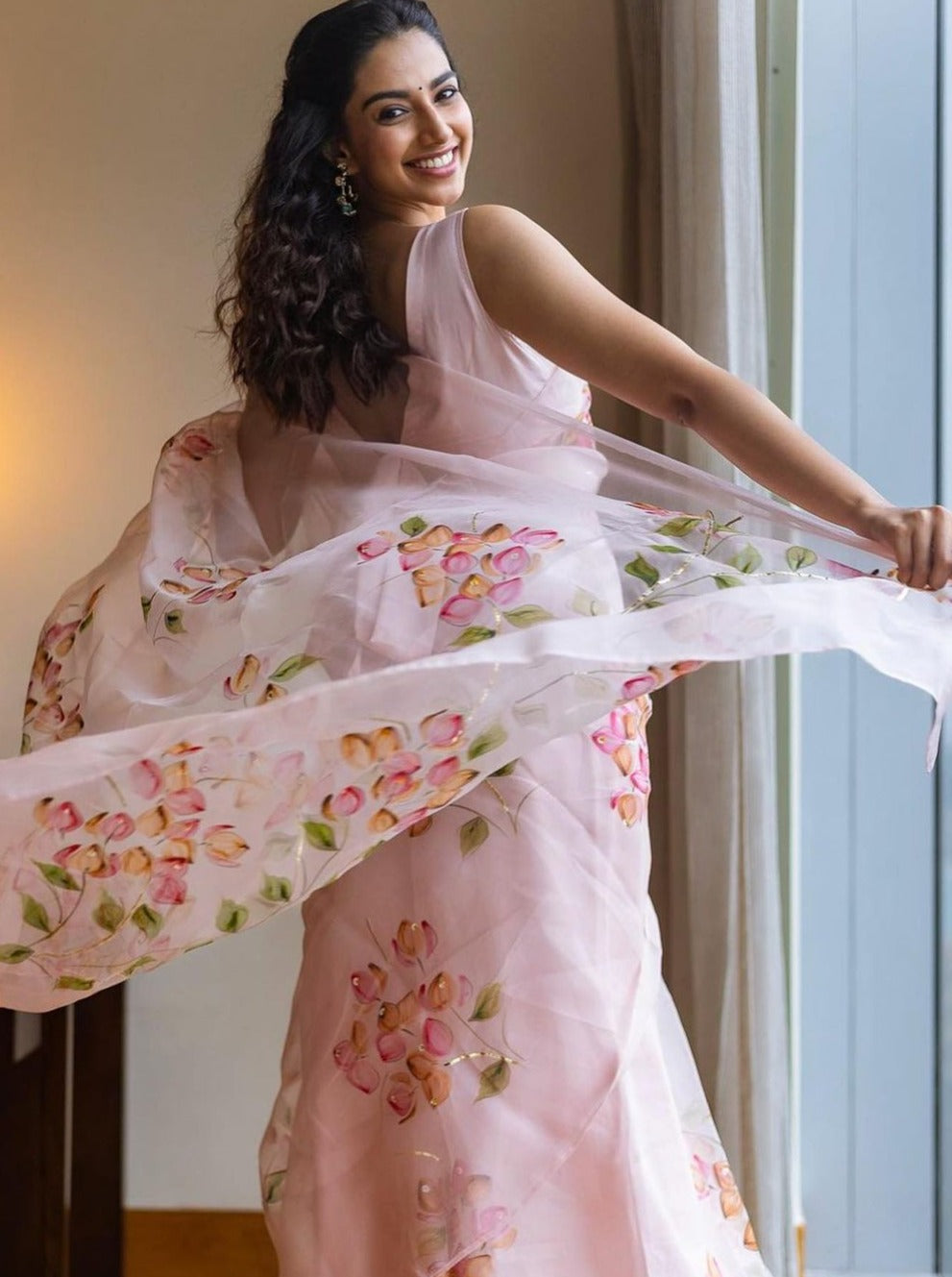 Shaded Bougainville’s on Dull Rose Organza Saree