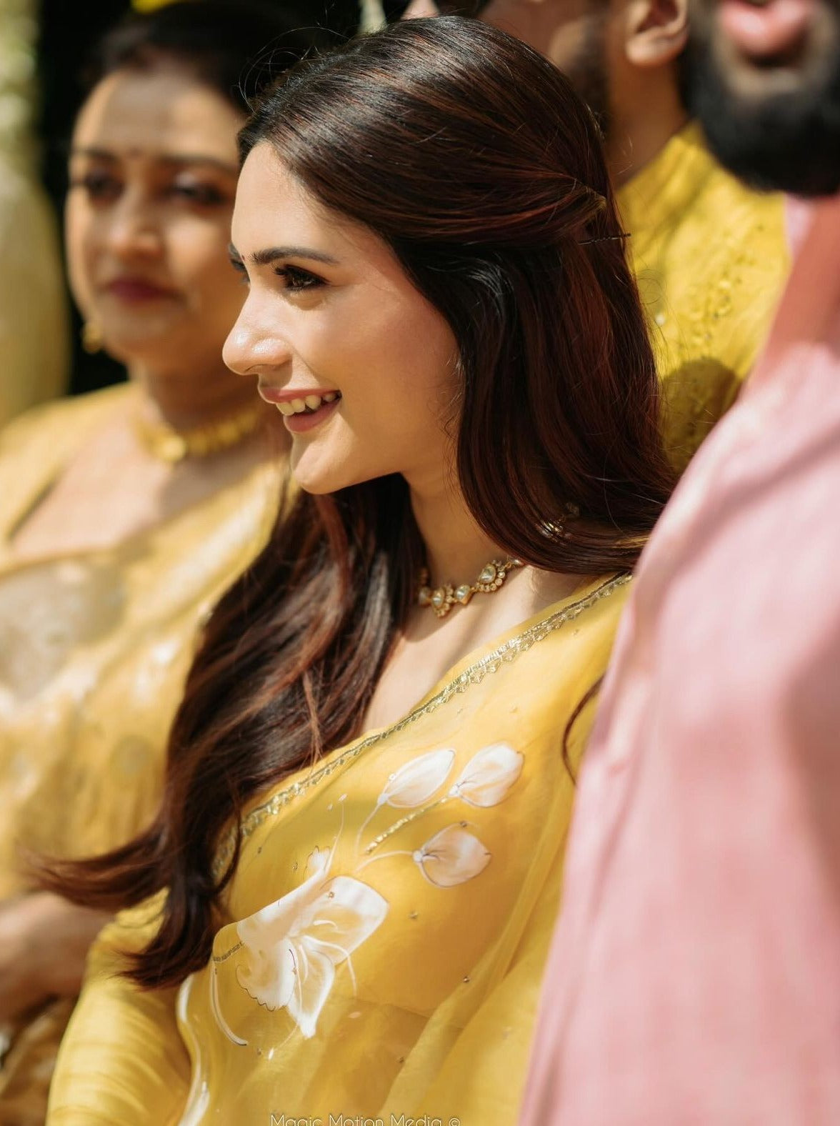 Lilies on Haldi Yellow organza saree with Sequins