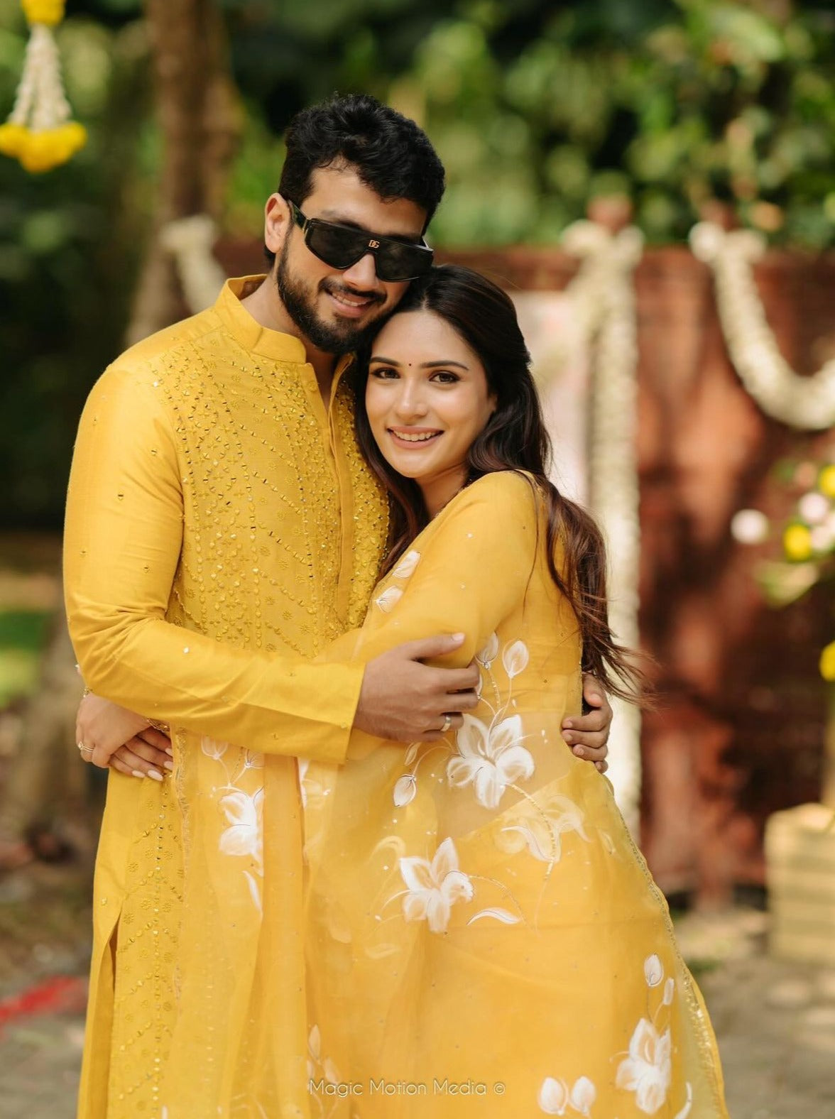 Lilies on Haldi Yellow organza saree with Sequins