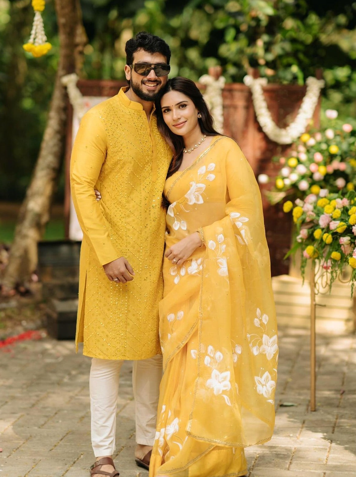 Lilies on Haldi Yellow organza saree with Sequins