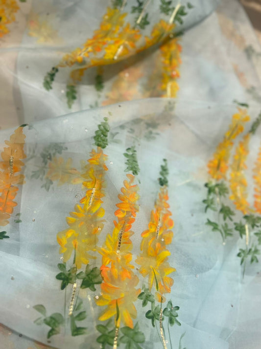 Yellow Popsicles on powder blue organza saree