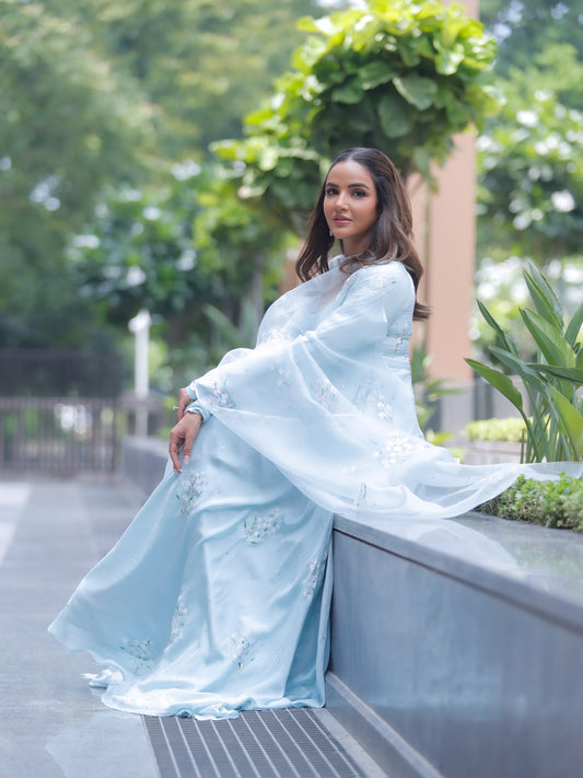 Parijat on Powder Blue flared kurta & dupatta with Sitara’s