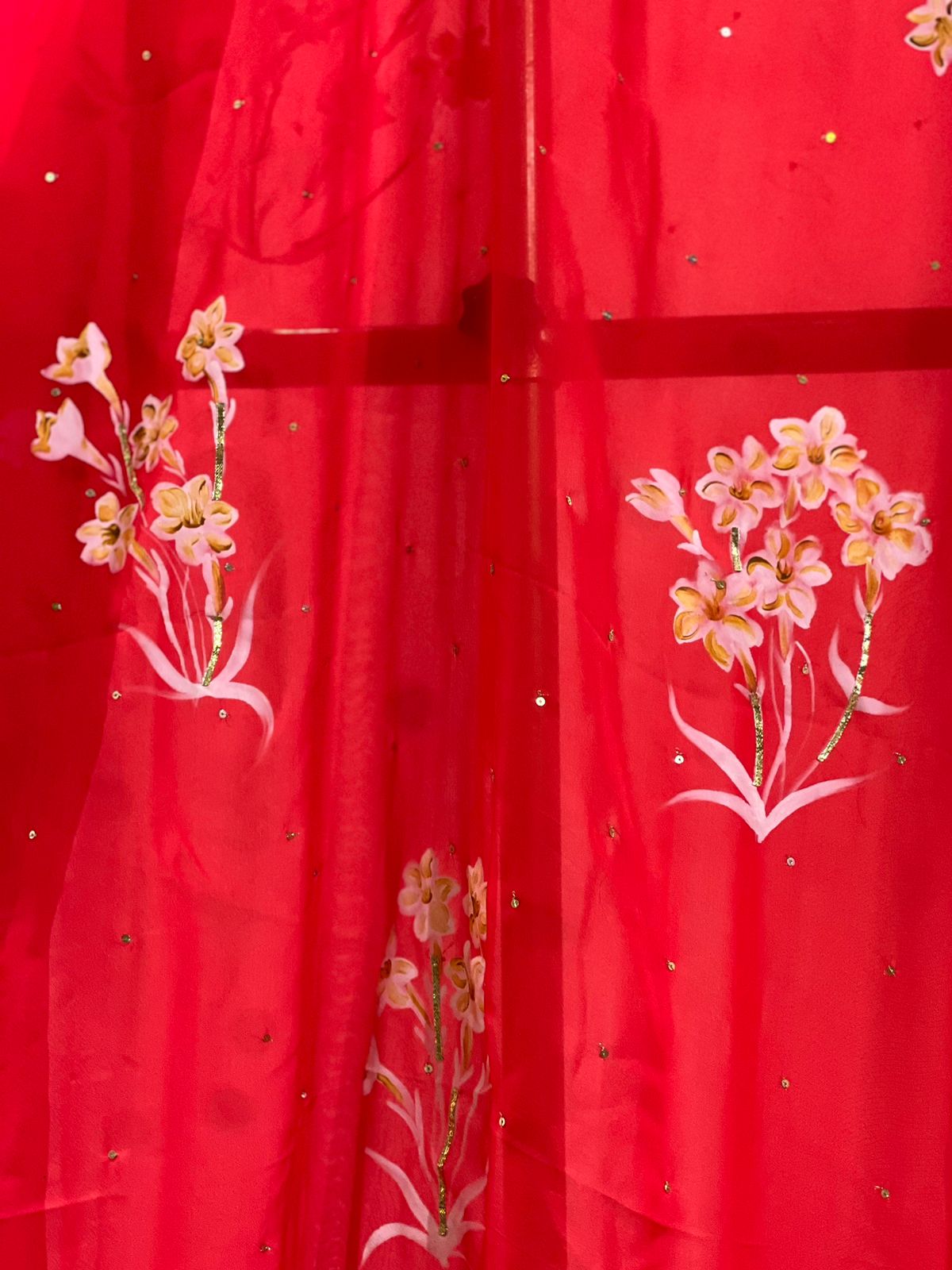 Tuber Roses on Red Flat Chiffon Saree With Sequins