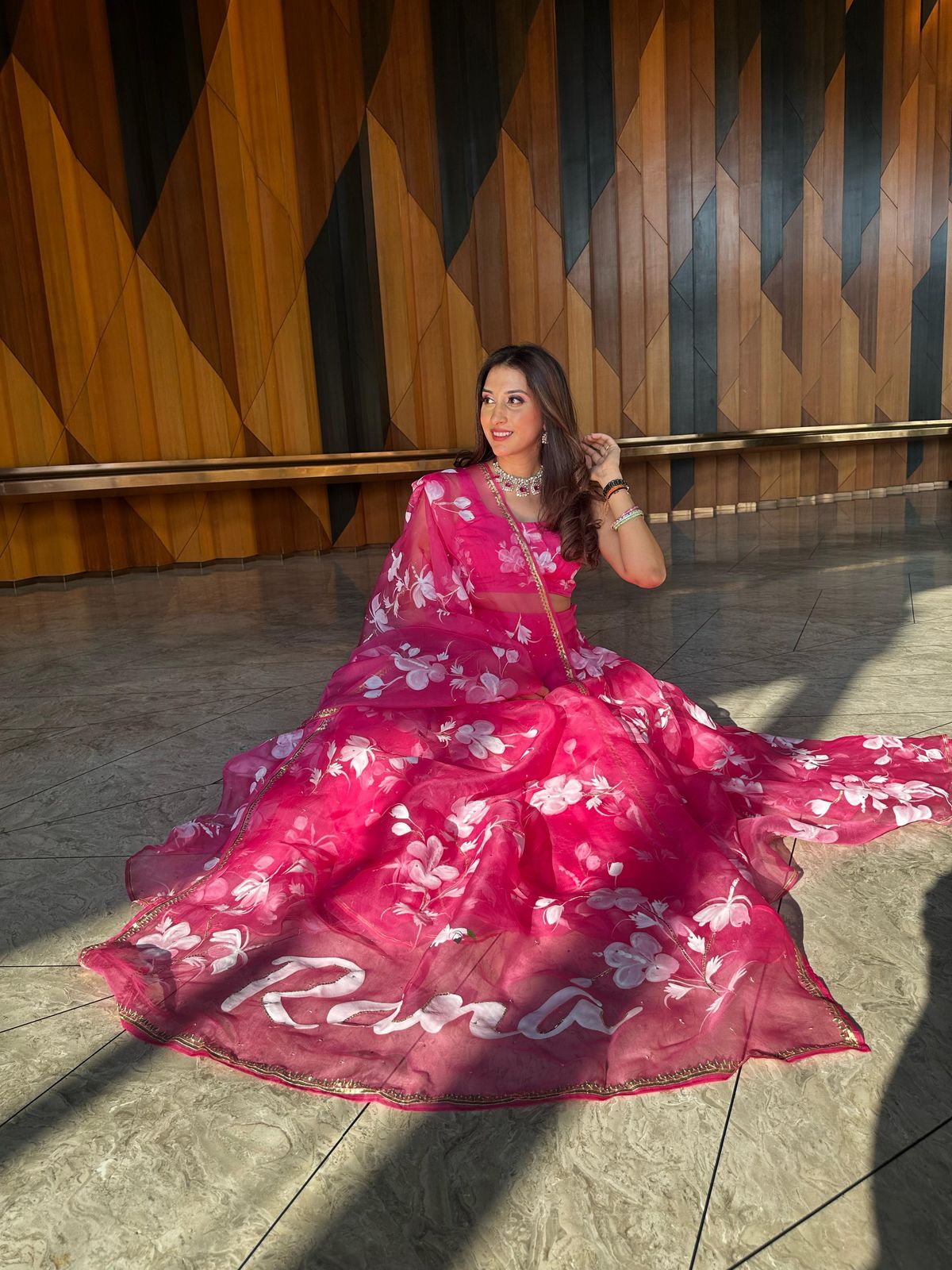 Hibiscus Roses on Raspberry Lehenga with Sequins & Border
