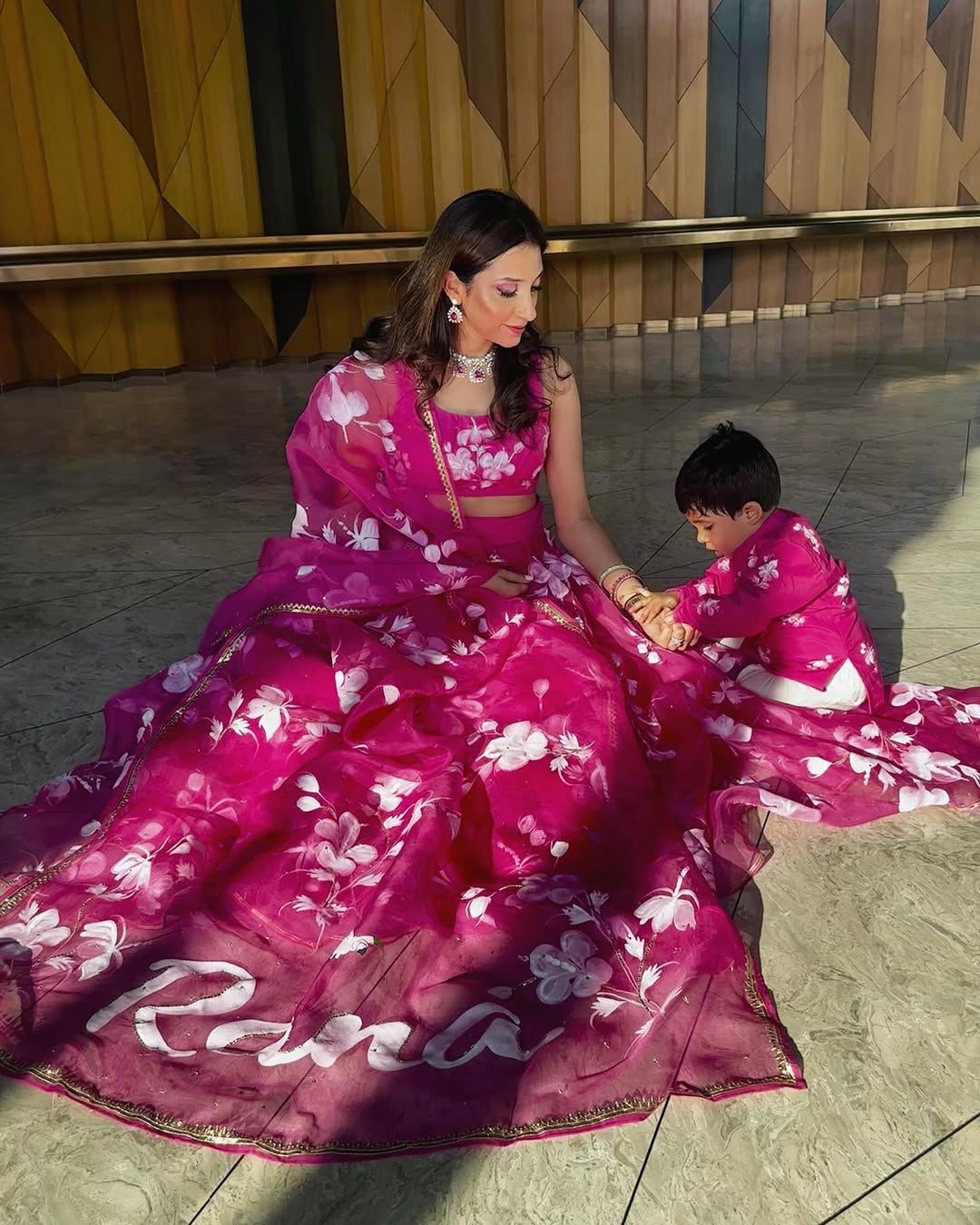 Hibiscus Roses on Raspberry Lehenga with Sequins & Border