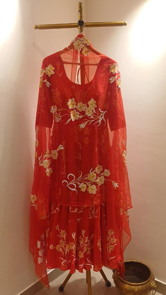 Tuber roses on red with Sitara’s flaired kurta