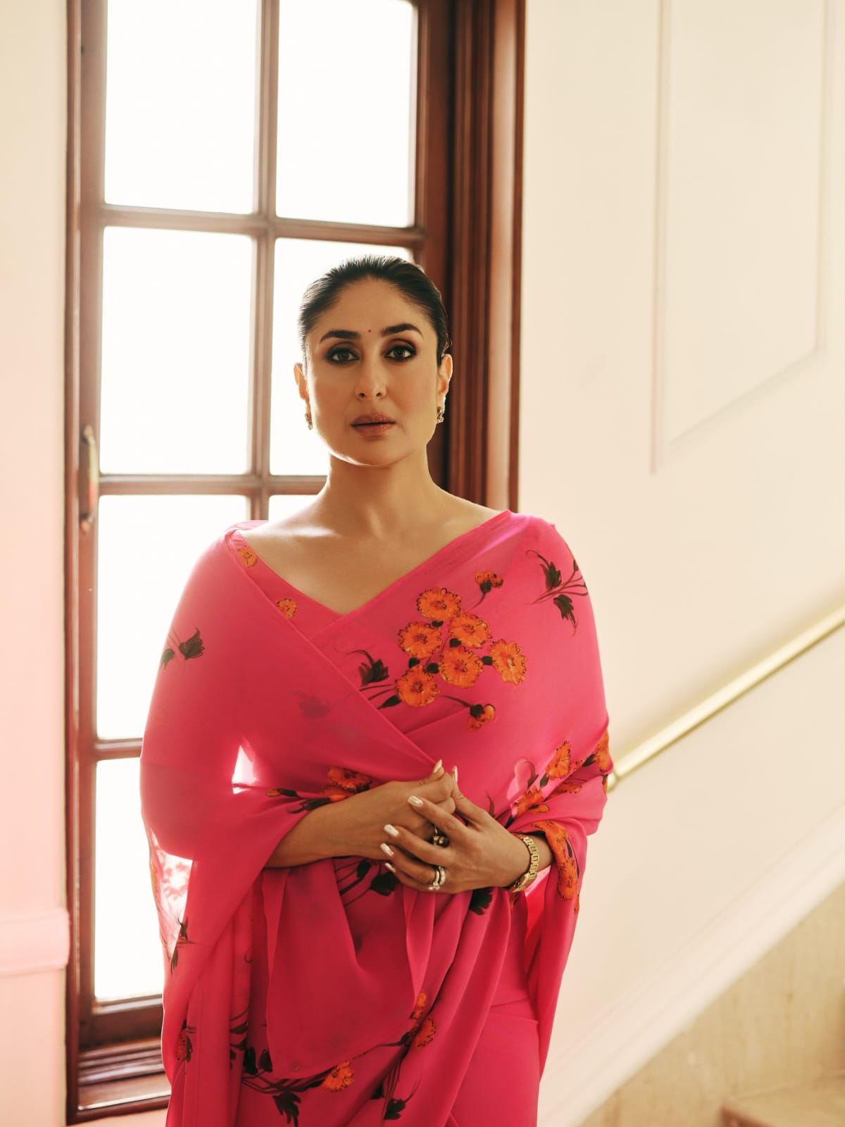 Kareena Kapoor in a custom marigolds on raspberry chiffon saree