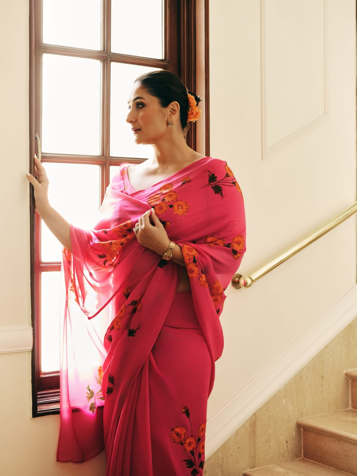 Kareena Kapoor in a custom marigolds on raspberry chiffon saree