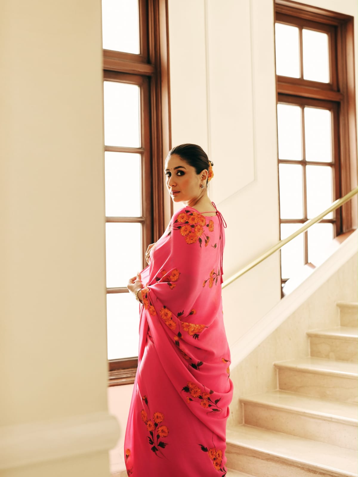 Kareena Kapoor in a custom marigolds on raspberry chiffon saree