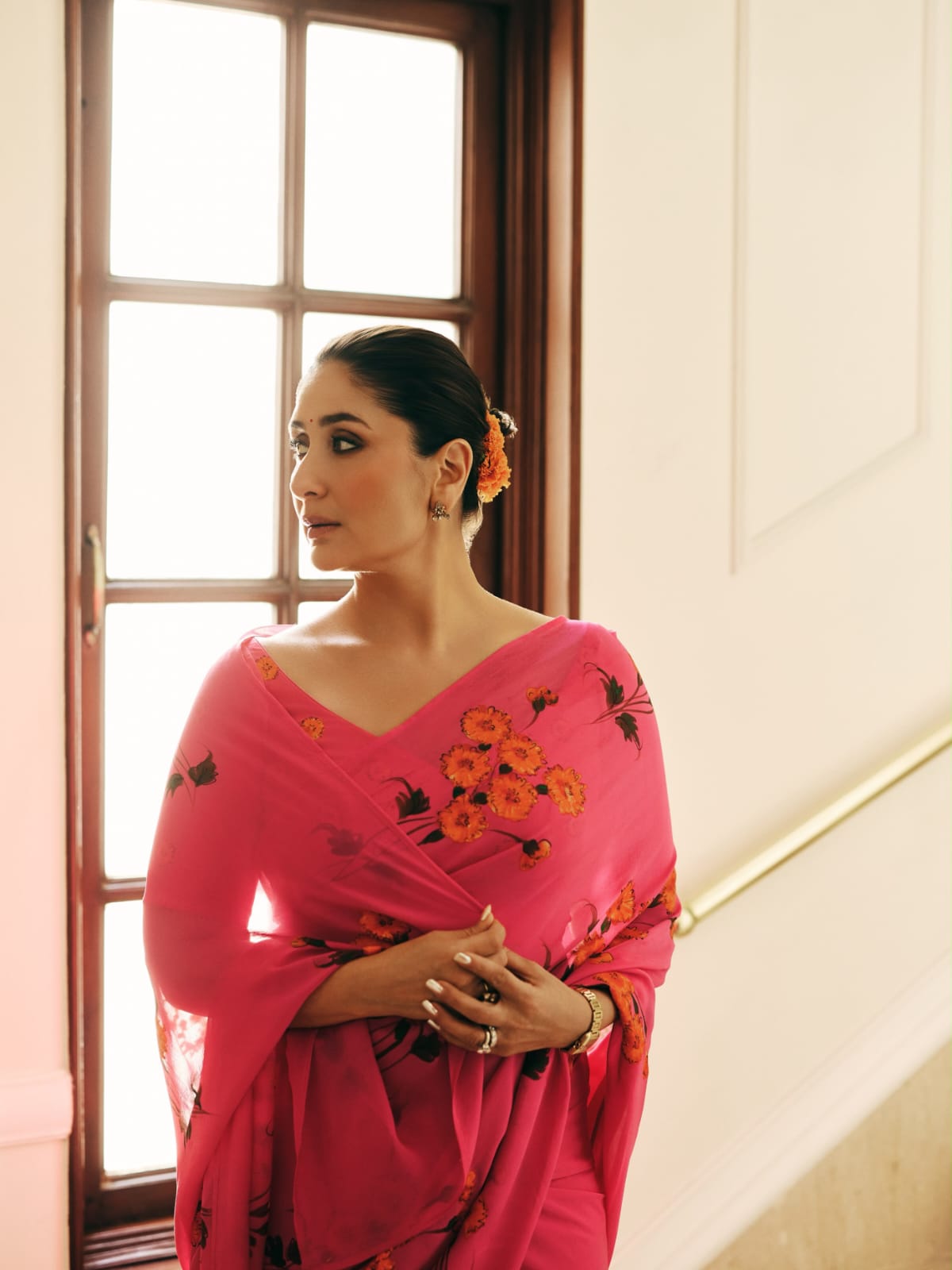 Kareena Kapoor in a custom marigolds on raspberry chiffon saree