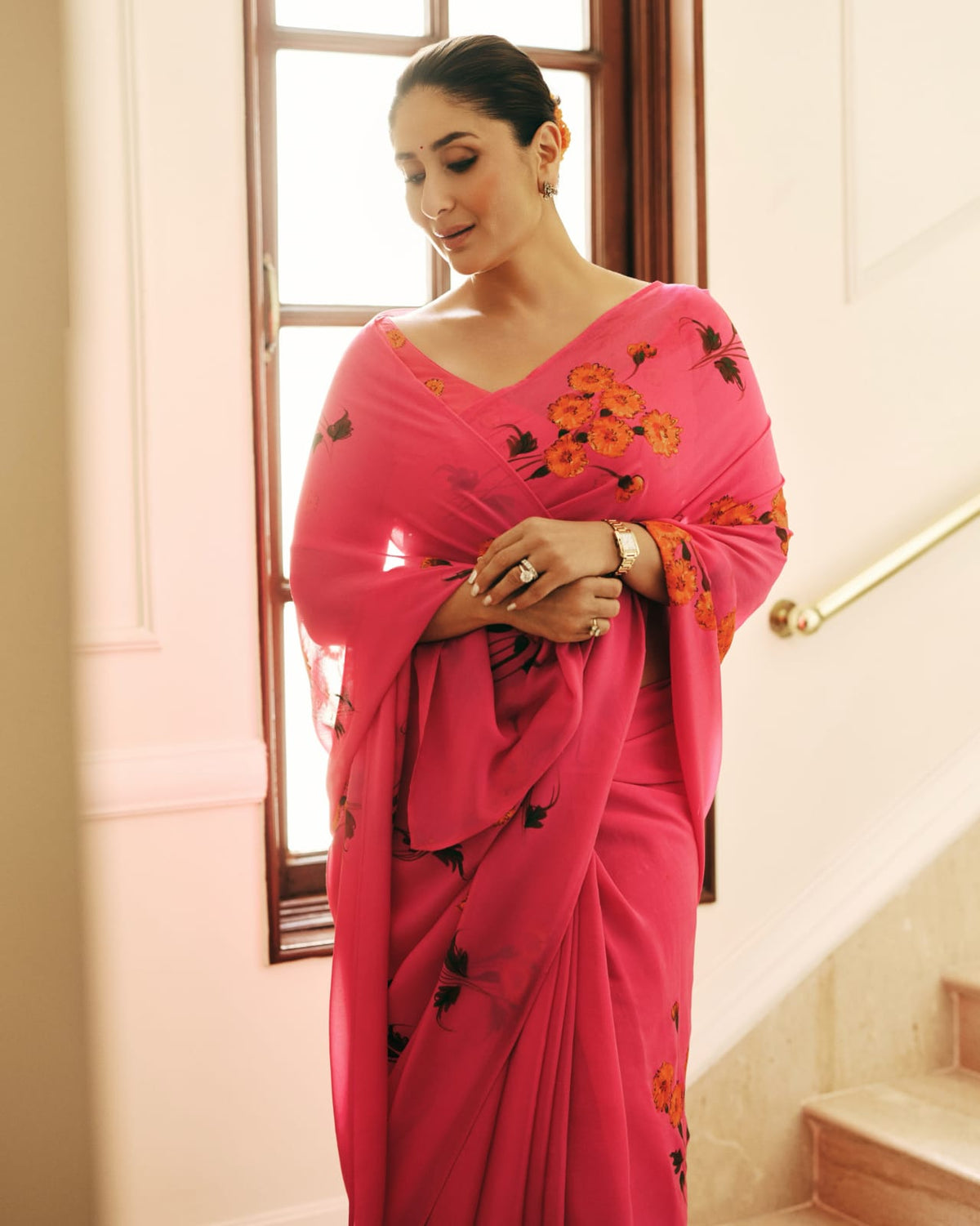 Kareena Kapoor in a custom marigolds on raspberry chiffon saree