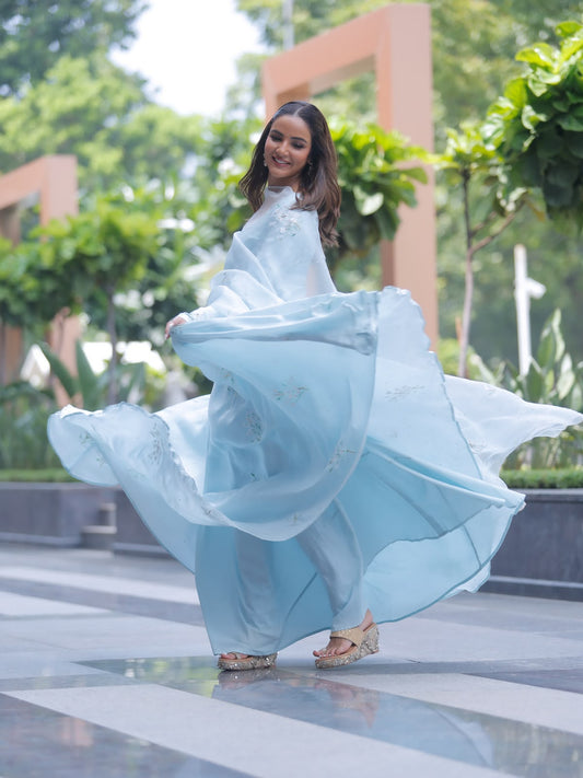 Parijat on Powder Blue flared kurta & dupatta with Sitara’s
