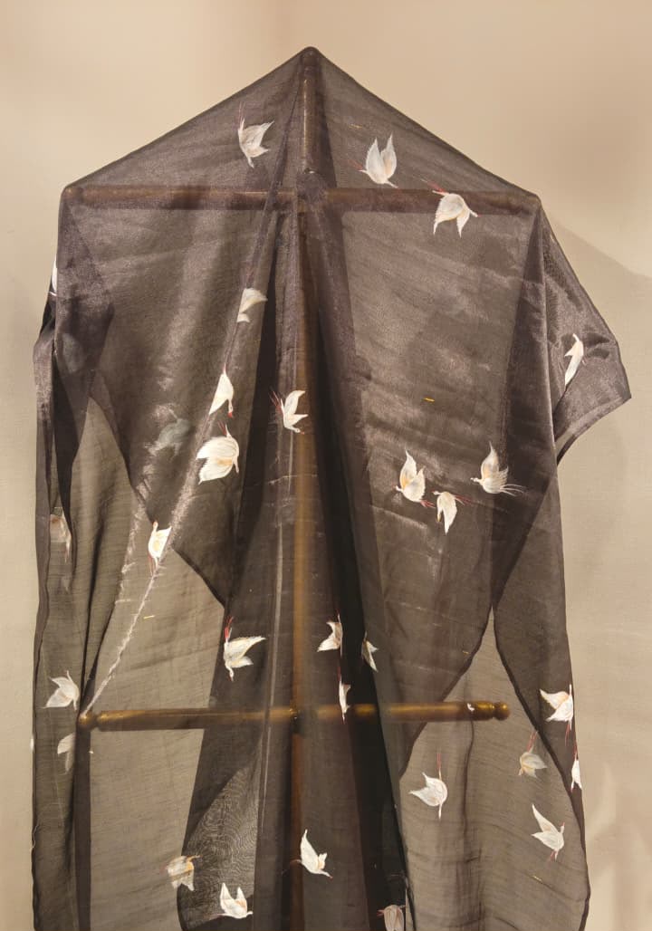 A Flock of Pearl Swans on a tissue saree in charcoal black