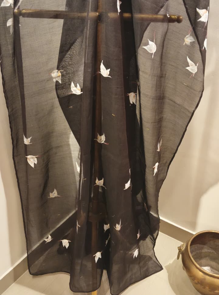 A Flock of Pearl Swans on a tissue saree in charcoal black