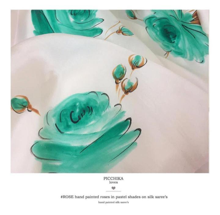 Forrest green roses on ivory silk saree