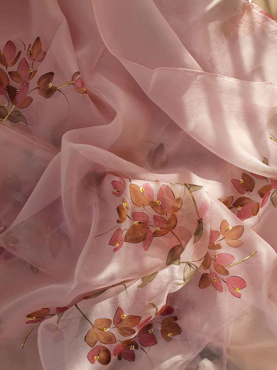 Shaded Bougainville’s on Dull Rose Organza Saree